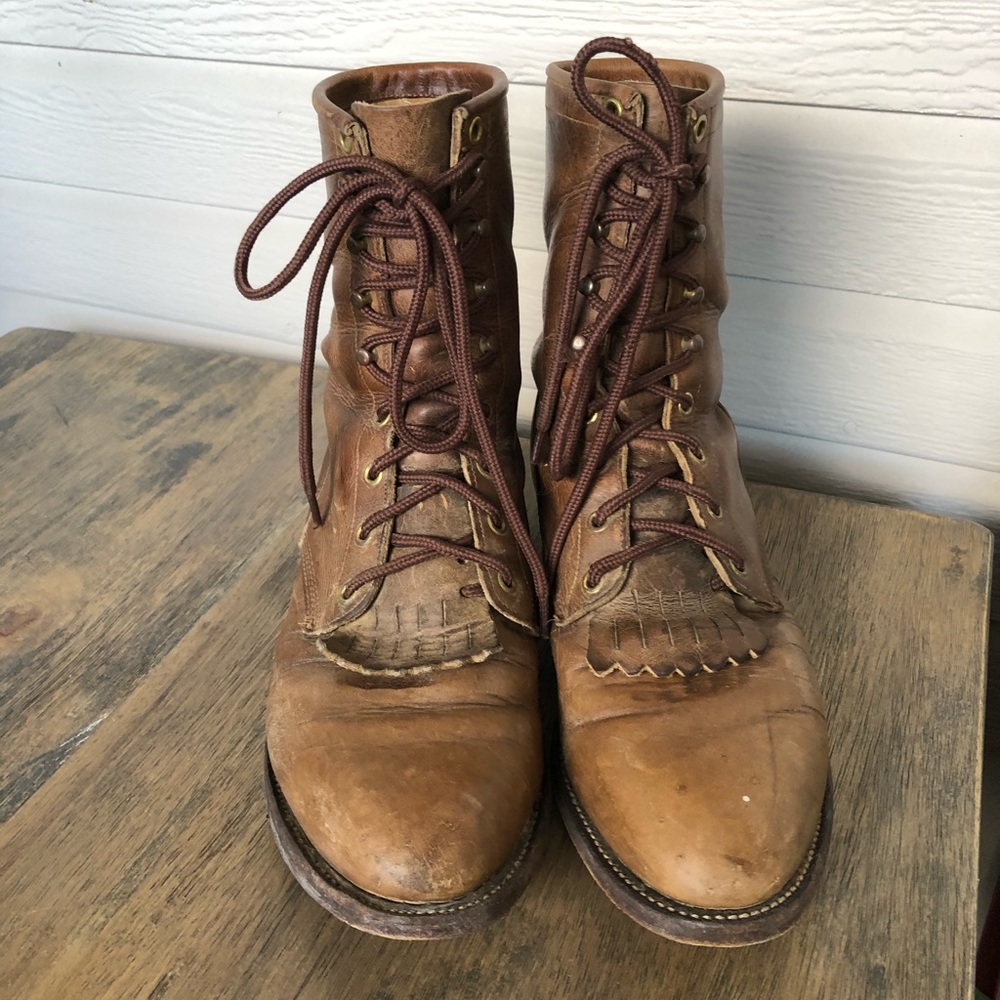 Justin lace up boots.